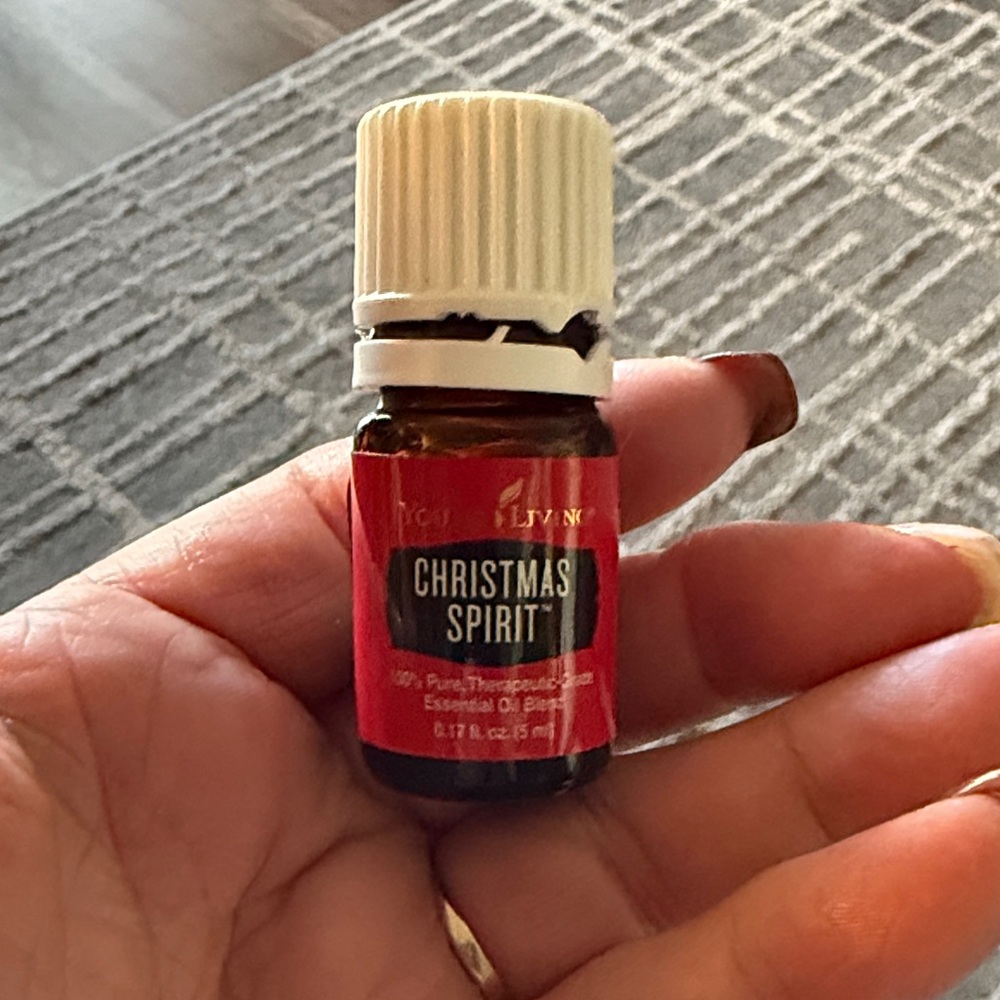 Young Living 100% Christmas Spirit Essential Oil. Opened 1/2 left in jar